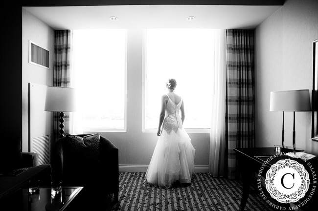 Bride getting ready for first look with husband photograph