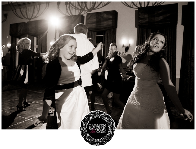 flower girl dancing with bride flower girl dancing with bride