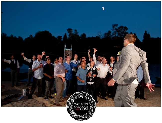 Garter toss groom photo