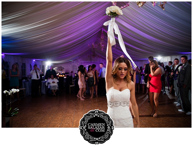 Dramatic bouquet toss portrait