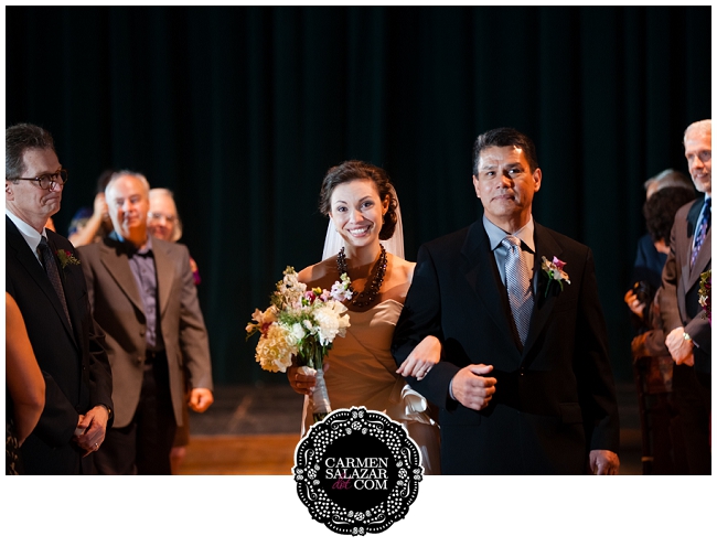 happy bride walking down aisle