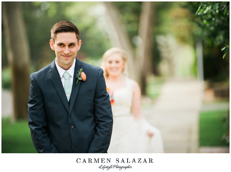 grin on groom for wedding day first look