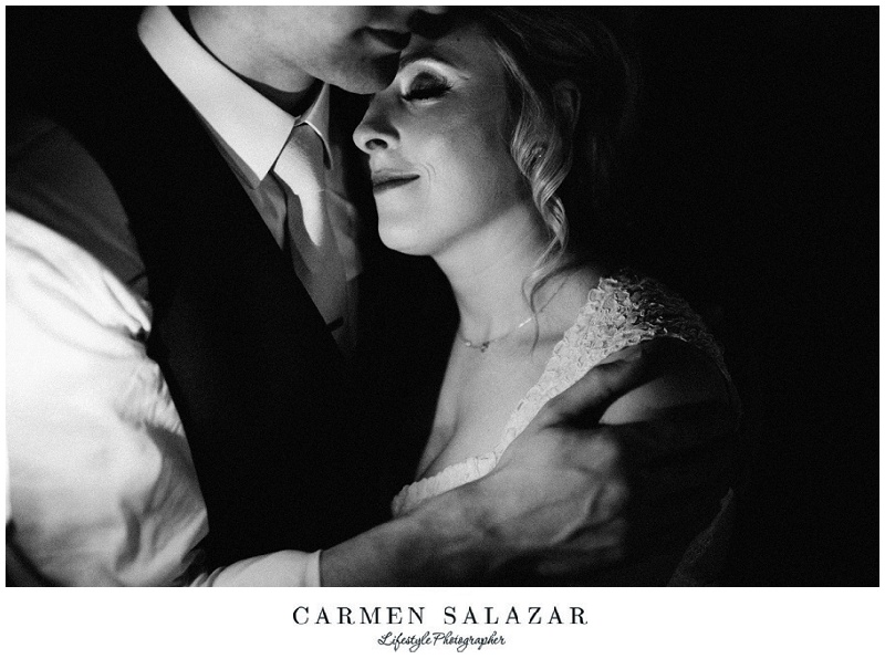 creative wedding portrait of a bride and groom by candle light