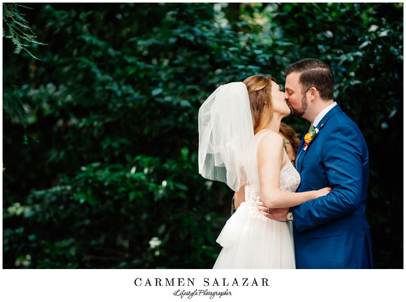 Outdoor-Art-Club-Wedding- bride and groom kissing photo