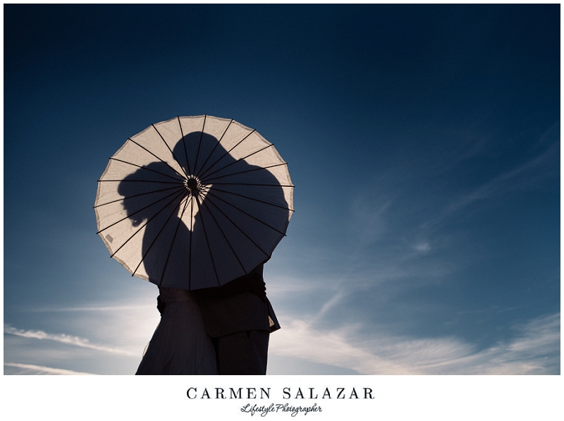 Creative silhouette bridal portrait with a sun umbrella at a Sacramento Outdoor Wedding