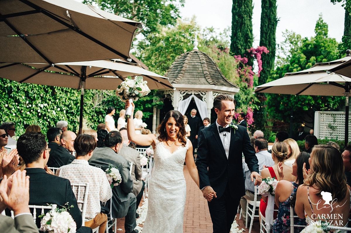 Newlyweds cheering after Vizcaya ceremony - Carmen Salazar