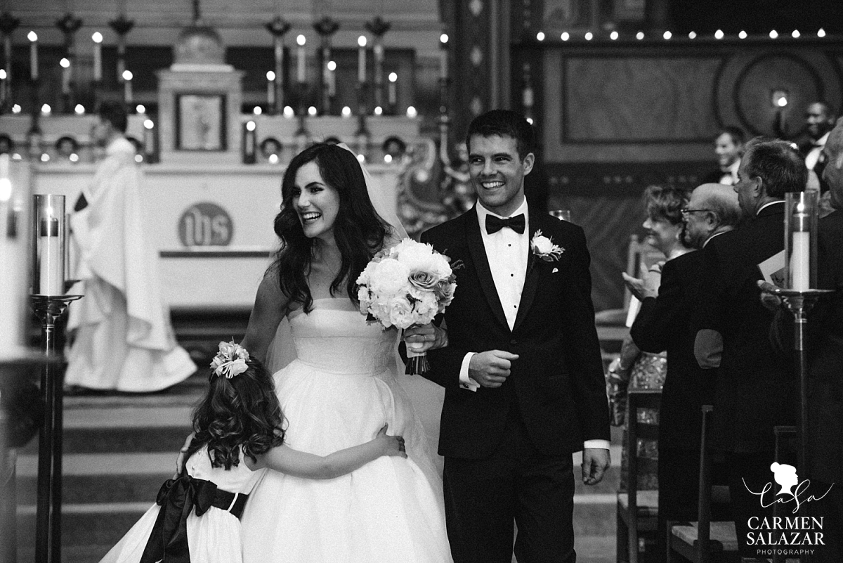 Happy newlyweds walking down aisle - Carmen Salazar Happy newlyweds walking down aisle - Carmen Salazar