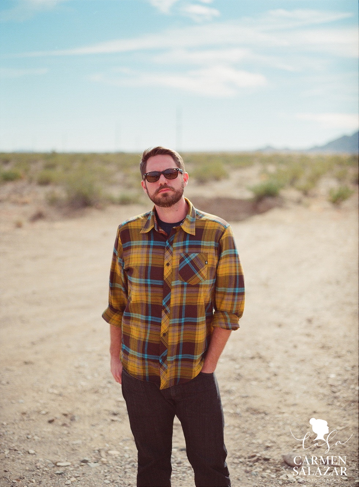 portrait of bearded man in flannel shirt in the desert by Carmen Salazar Photography portrait of bearded man in flannel shirt in the desert by Carmen Salazar Photography
