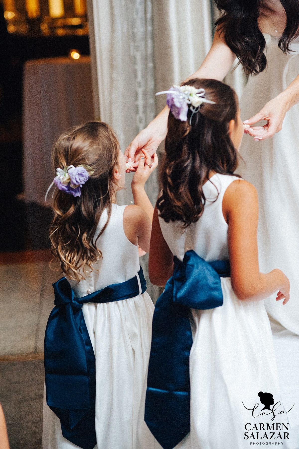 Bride feeding flower girls wedding cake - Carmen Salazar Bride feeding flower girls wedding cake - Carmen Salazar