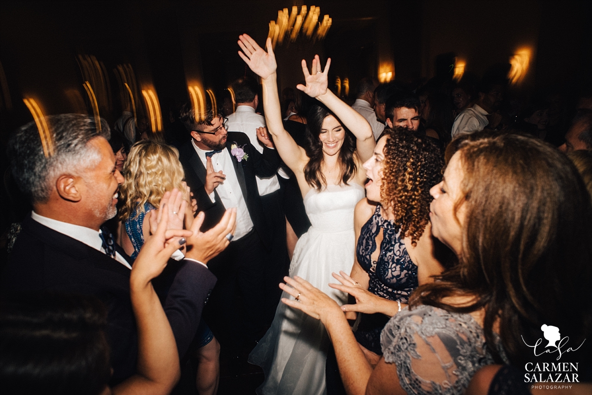Beautiful bride dancing with friends - Carmen Salazar Beautiful bride dancing with friends - Carmen Salazar