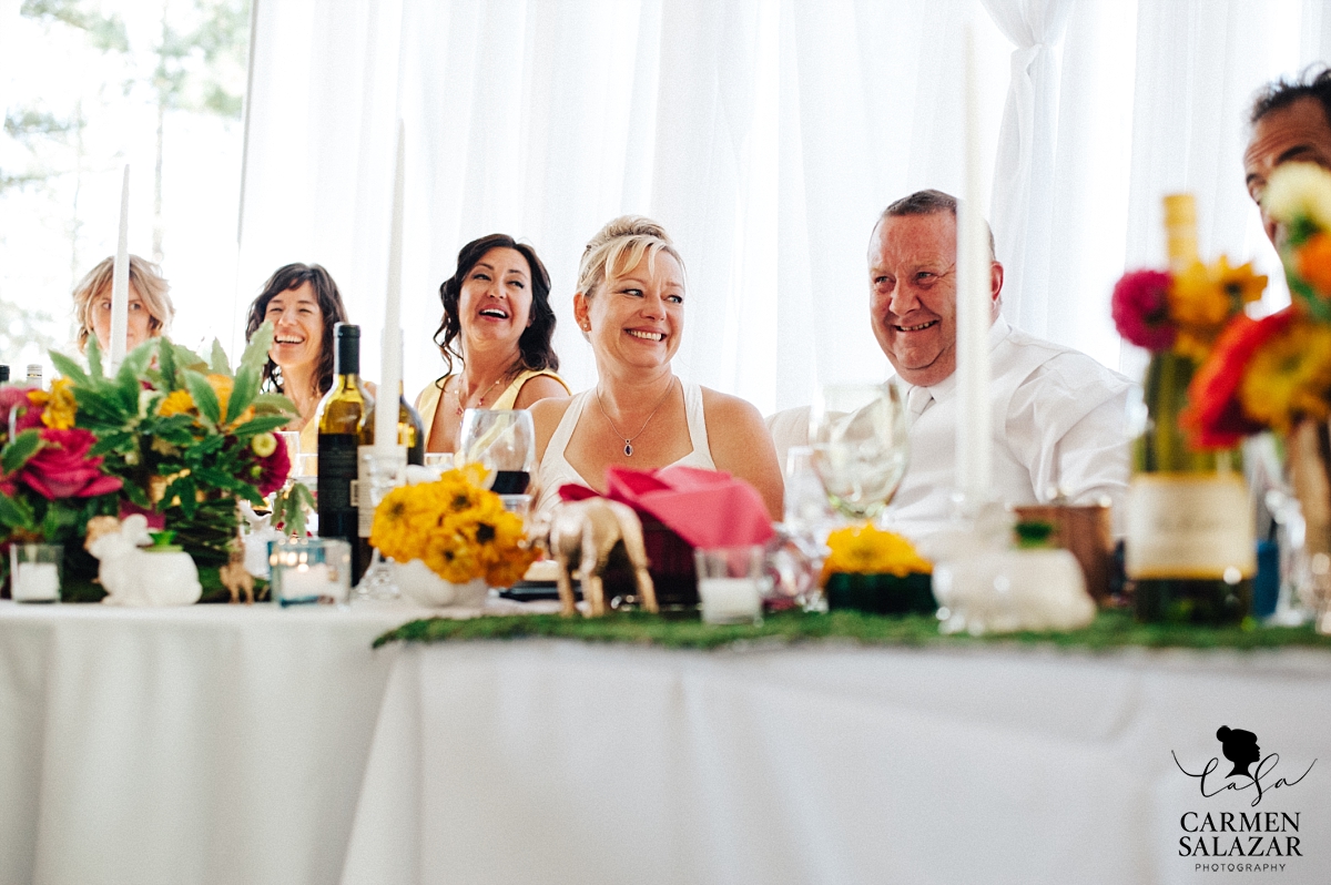 Happy bride and groom at DIY design head table - Carmen Salazar Happy bride and groom at DIY design head table - Carmen Salazar