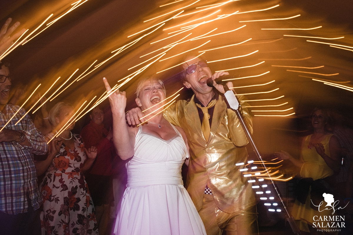 Bride singing with Pop Rocks cover band at Chalet View Lodge reception - Carmen Salazar Bride singing with Pop Rocks cover band at Chalet View Lodge reception - Carmen Salazar