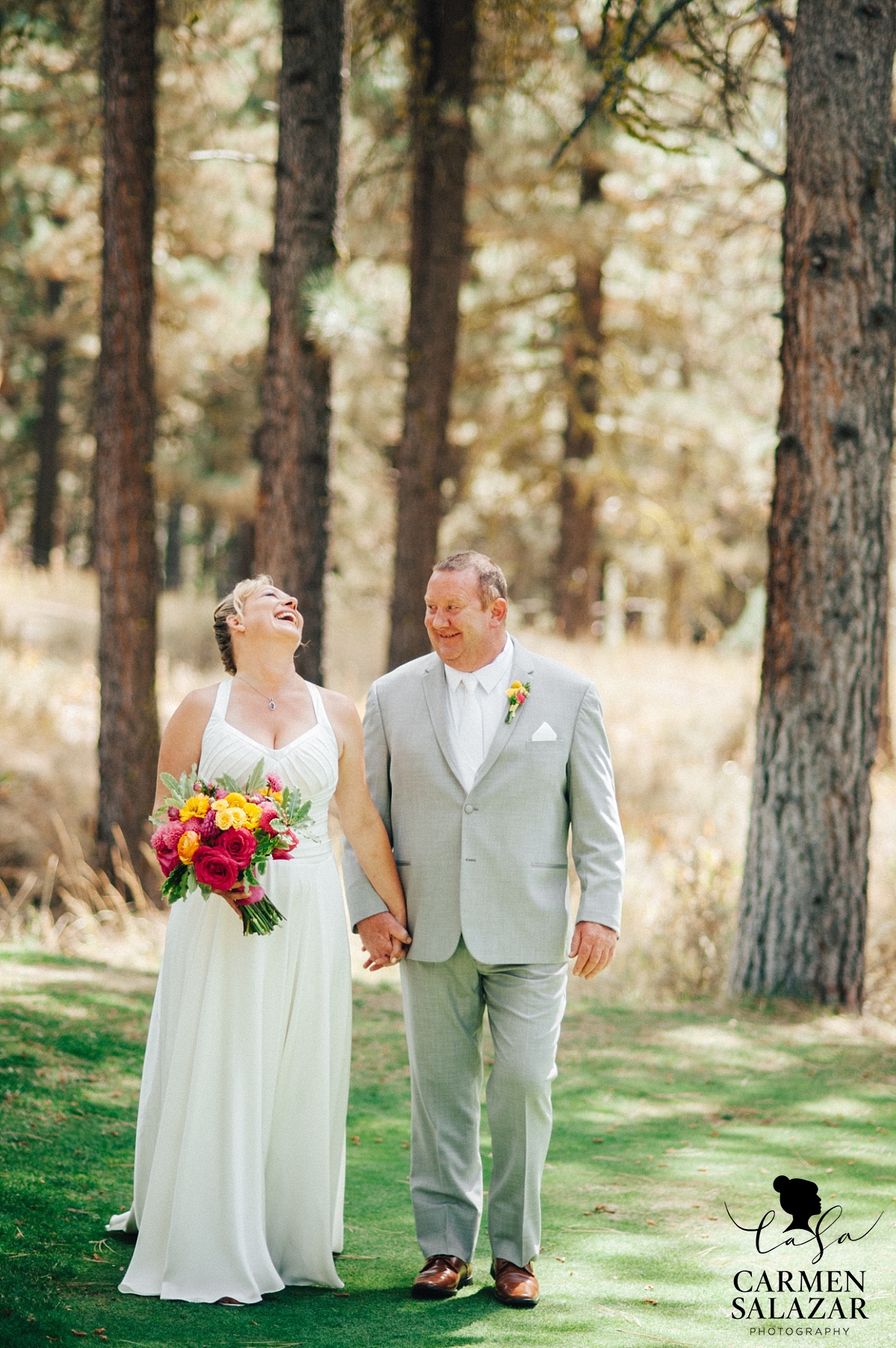 Bride and groom laughing at Tahoe ceremony - Carmen Salazar Bride and groom laughing at Tahoe ceremony - Carmen Salazar