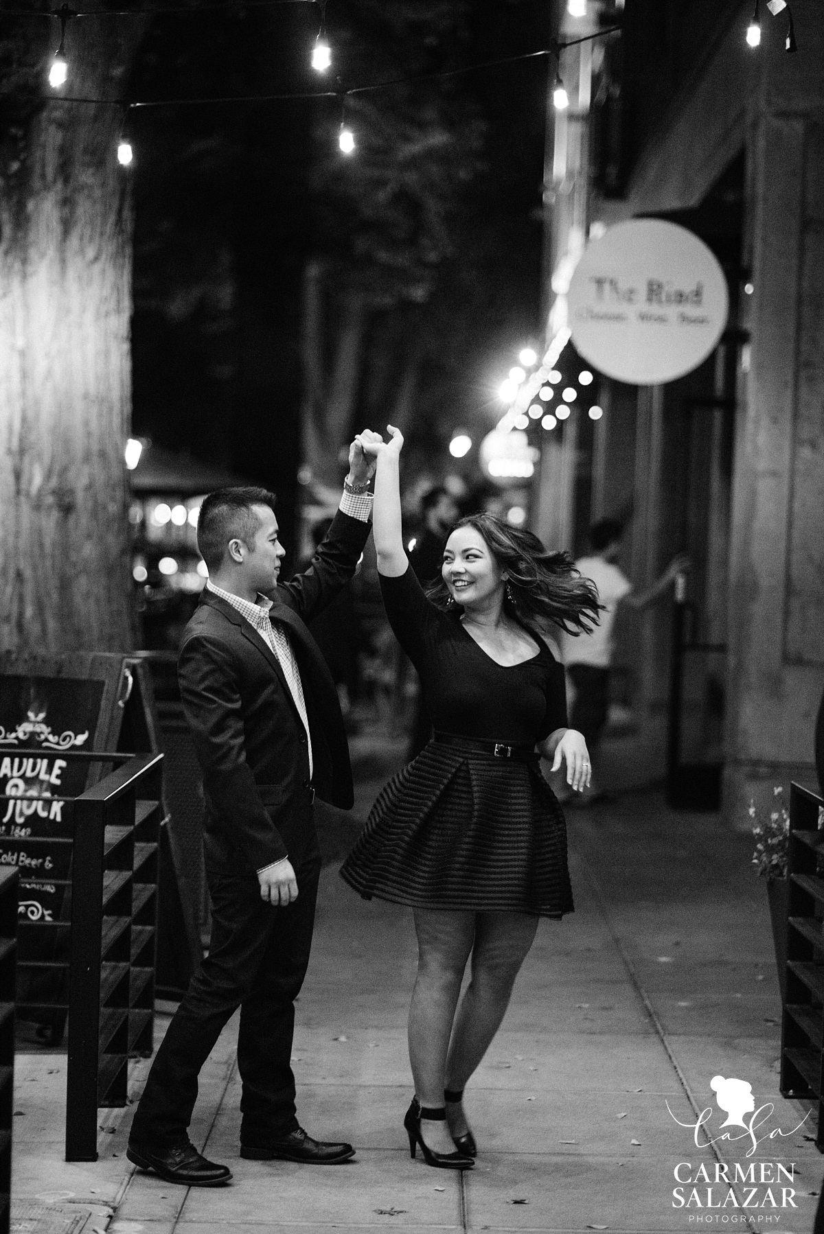 Couple dancing in Downtown engagement session - Carmen Salazar Couple dancing in Downtown engagement session - Carmen Salazar