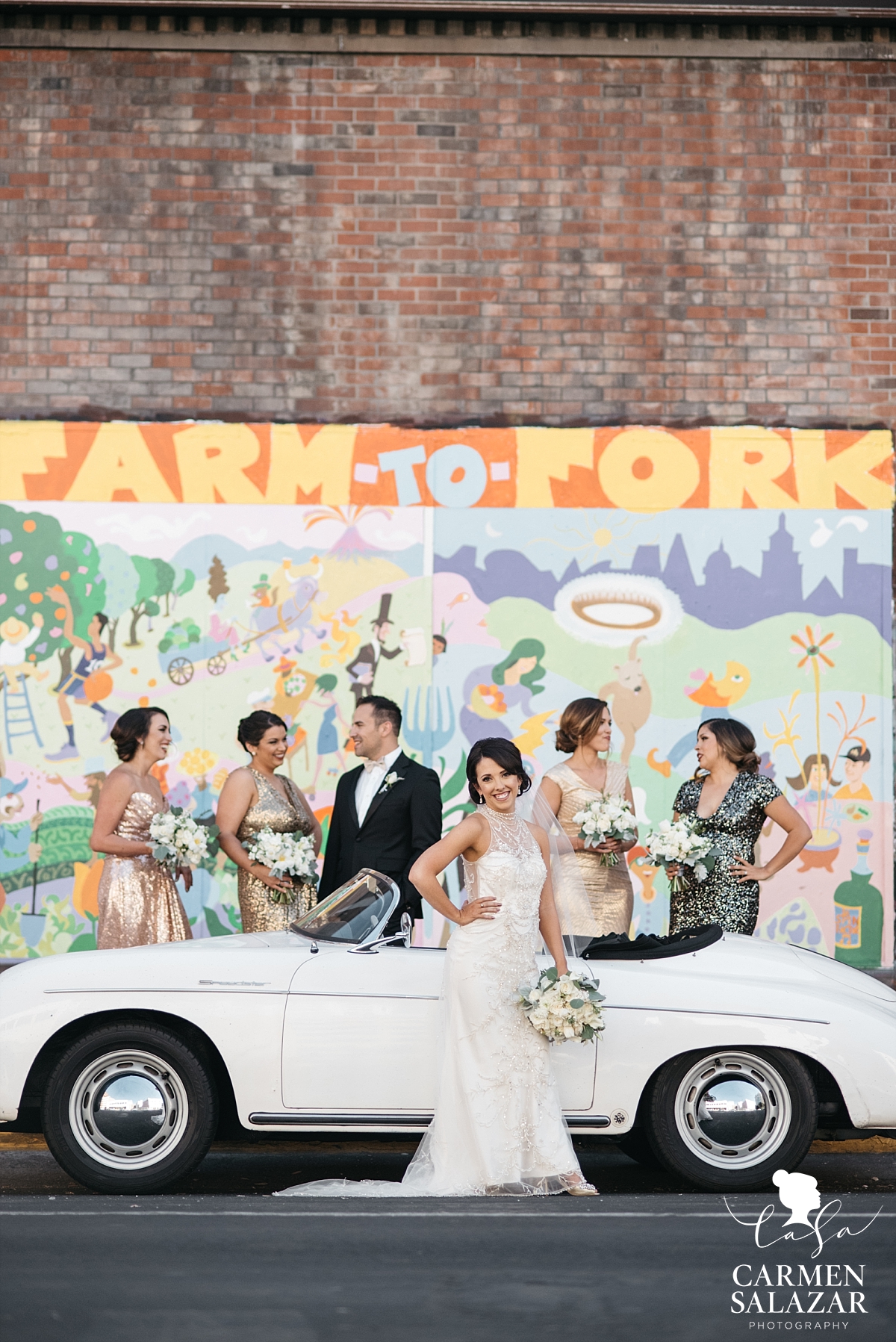 Bride and bridesmaids posing with vintage Porsche - Carmen Salazar Bride and bridesmaids posing with vintage Porsche - Carmen Salazar